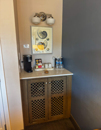 Coffee Station -Sand Pebbles Inn Guest Room - Mini Travel Adventures 4 Us Coffee and refreshment station in a guest room at Sand Pebbles Inn.