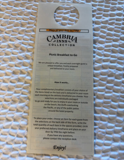 Picnic Breakfast to Go door hanger at Sand Pebbles Inn in Cambria, California.