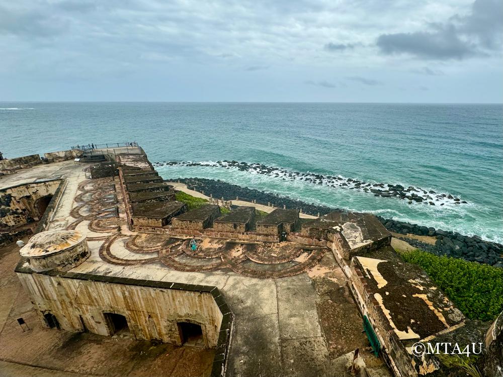 Aerial view of El Morro fortress in San Juan, Puerto Rico, with the Atlantic Ocean stretching out in the background.