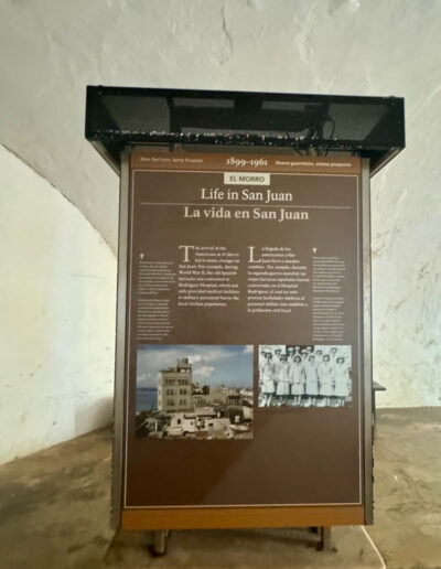 Information display inside El Morro fortress in San Juan, Puerto Rico, describing the history and significance of the site.