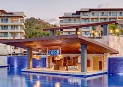 Saint Lucia Family Resort Getaway - Mini Travel Adventures 4 Us Caribbean resort in Saint Lucia with large pool and scenic mountain views.