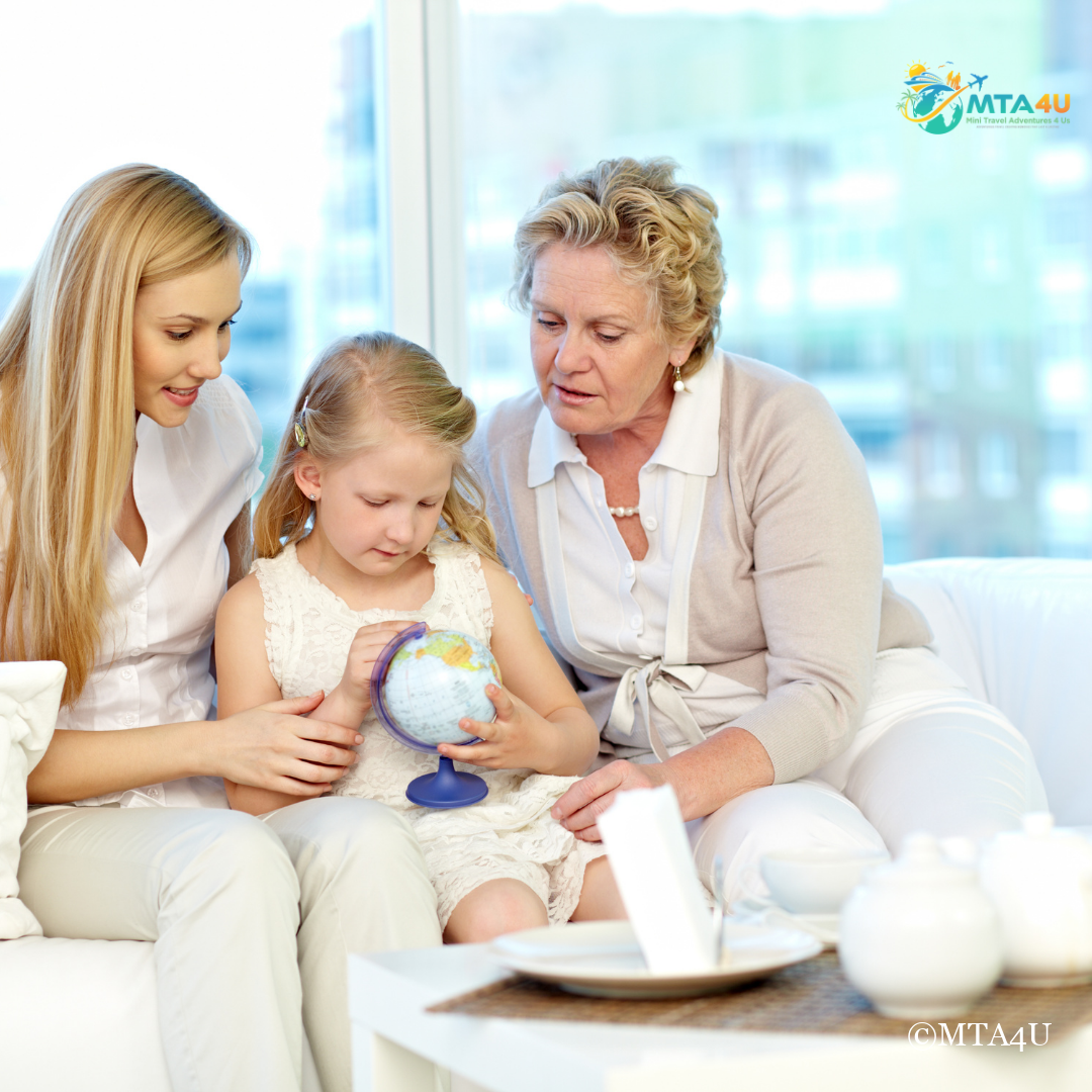 hree generations of women looking at a globe together for vacation planning tips.