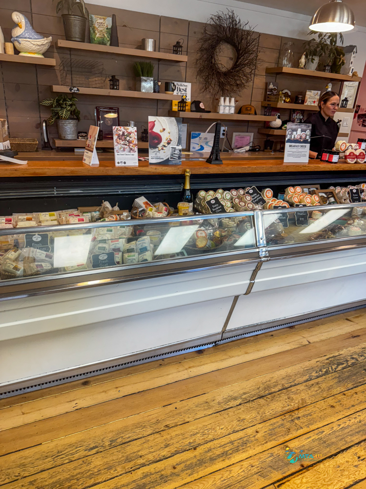 Cheese counter at Marin Cheese Factory in California during a Point Reyes day trip itinerary.