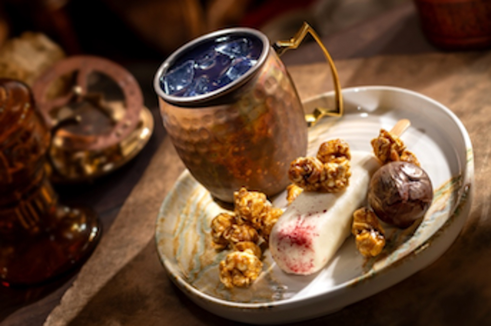 Treasure Trove non-alcoholic drink at The Beak and Barrel with ube, lemon, coconut, vanilla cake, and caramel popcorn.<br>

