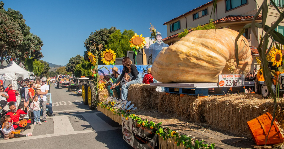 Giant pumpkin float in the Great Pumpkin Parade at the Half Moon Bay Art and Pumpkin Festival in California.